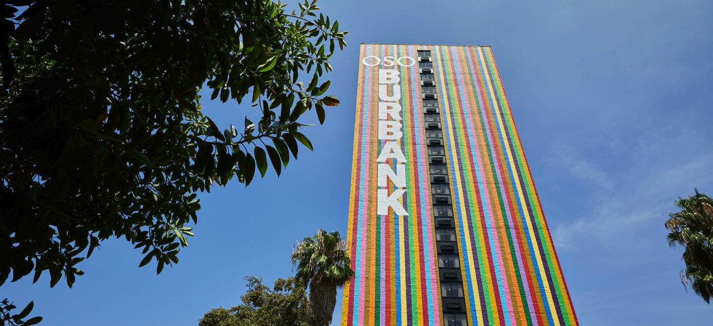 The striped Burbank sign against a blue sky