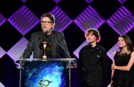 Winner Black phone receiving their award at The Saturn Awards
