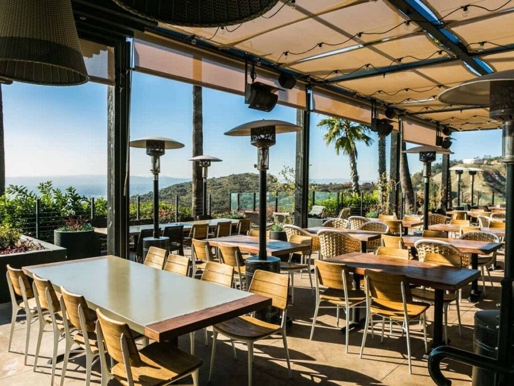 Castaway Burbank dining room with view of patio