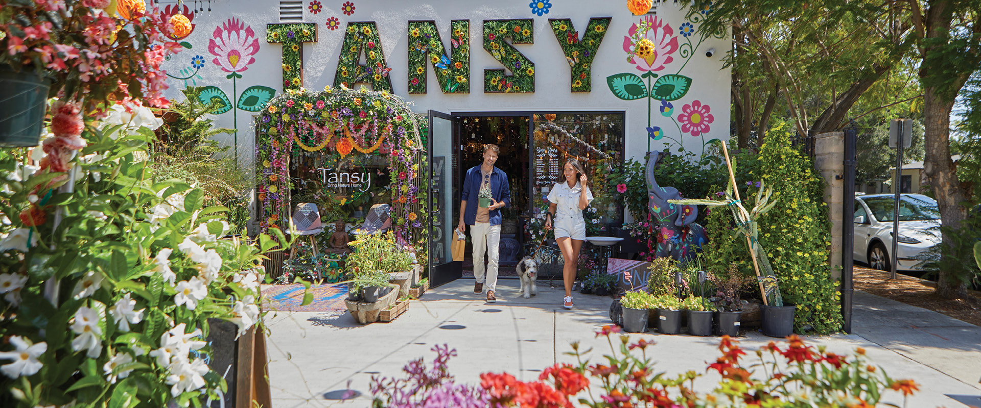 Visitors leaving Tansy, a flower and gift shop in Burbank.