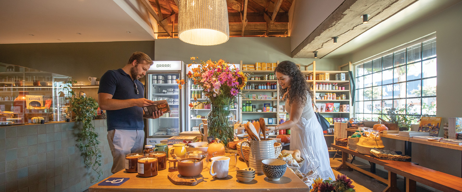 Shoppers browse home goods, gifts and specialty foods inside a boutique in Burbank’s Magnolia Park neighborhood.