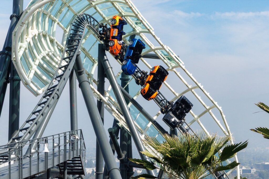 Riders invert on the Fast & Furious: Hollywood Drift roller coaster track at Universal Studios Hollywood